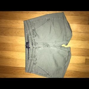 green cuffed shorts